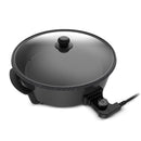 Tavazade K2101 çok amaçlı pizza tavası siyah kullanım sırasında pizza pişirme